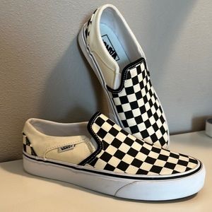 Vans checkered black/off-white women’s shoes.  Worn once.  Size 7.  Slip-ons